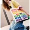 ΣΕΙΡΑ INSTINCTOY HUG YOU – Τσάντα από καμβά